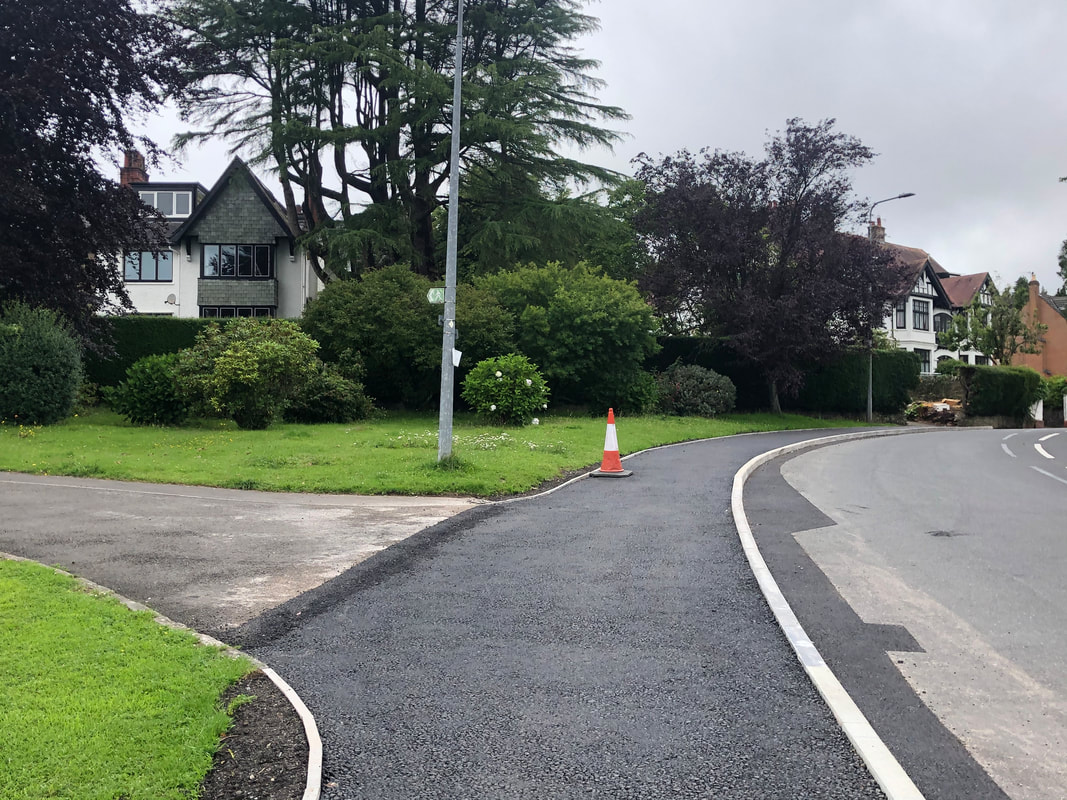 Another picture of the bend on Windsor Road showing the new pavement